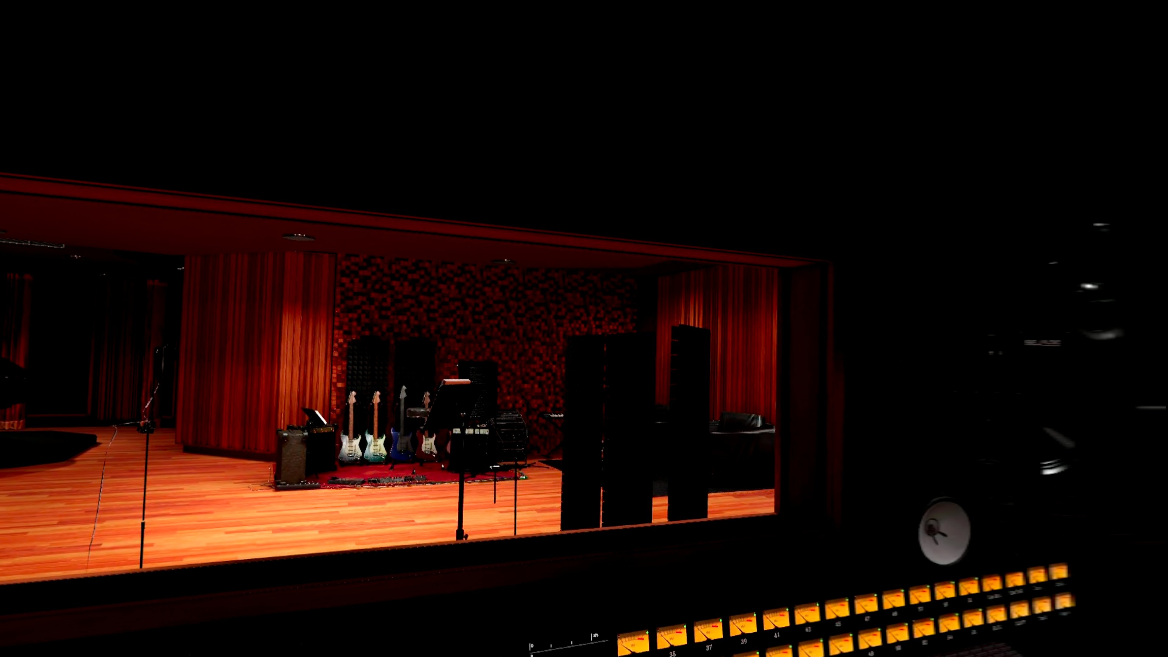 Guitars viewed through the studio glass